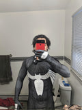 Person wearing a custom handmade Symbiote TASM Suit
