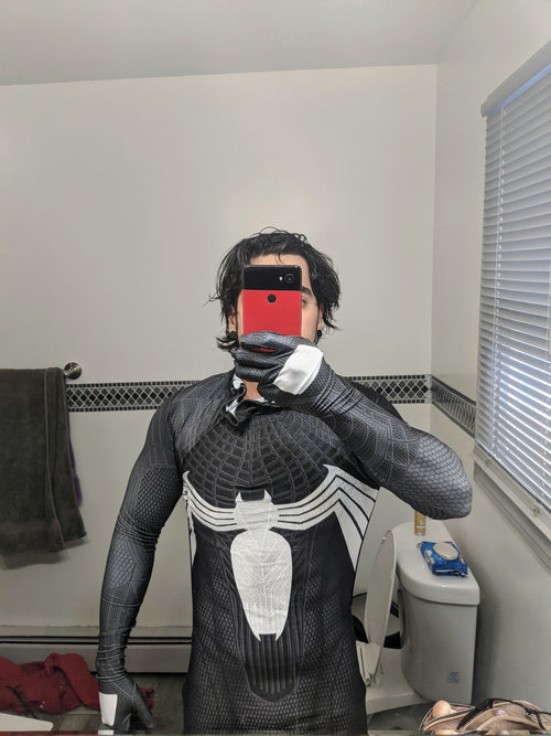Person wearing a custom handmade Symbiote TASM Suit
